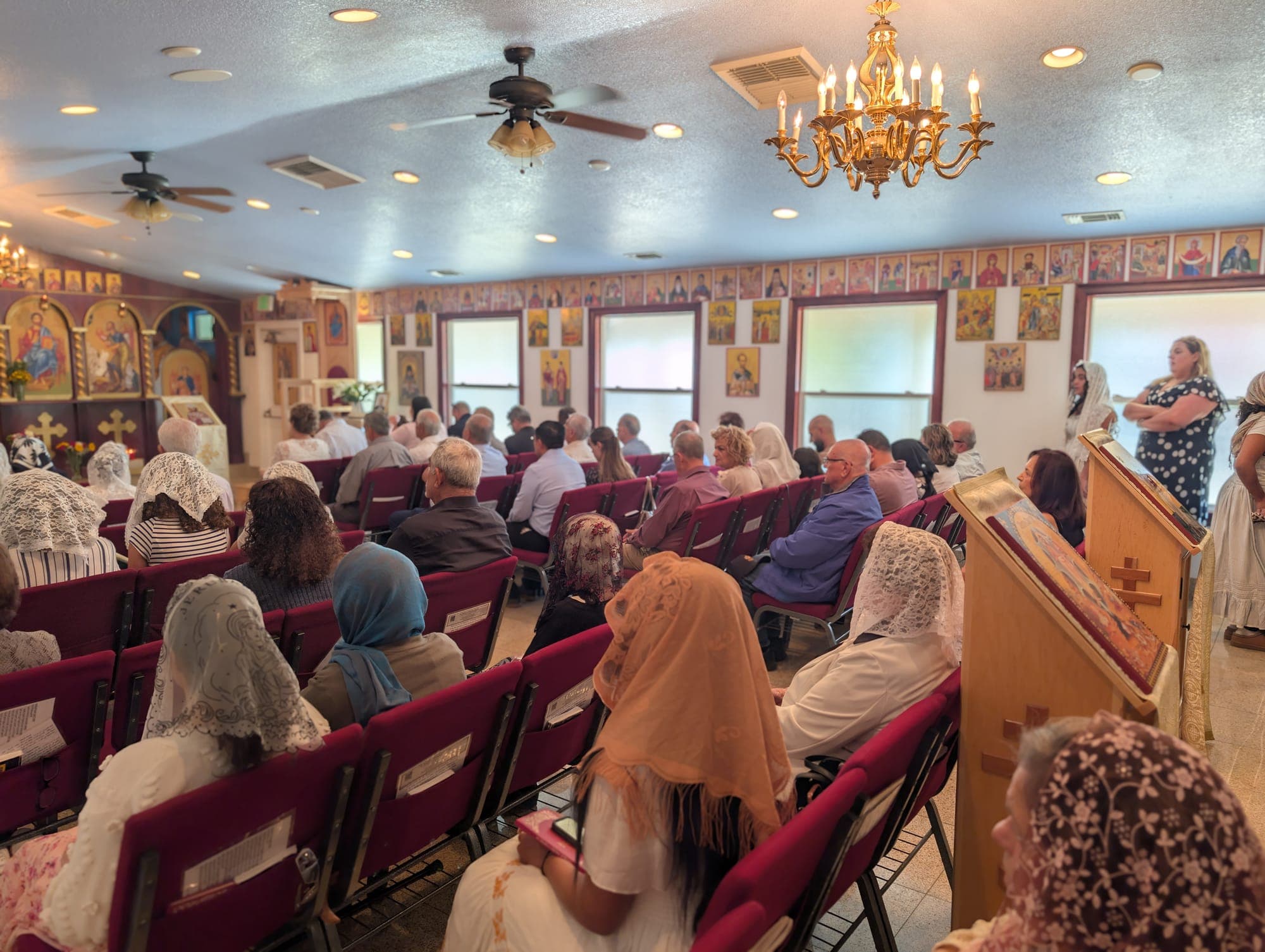 The congregation standing in prayer during the Divine Liturgy