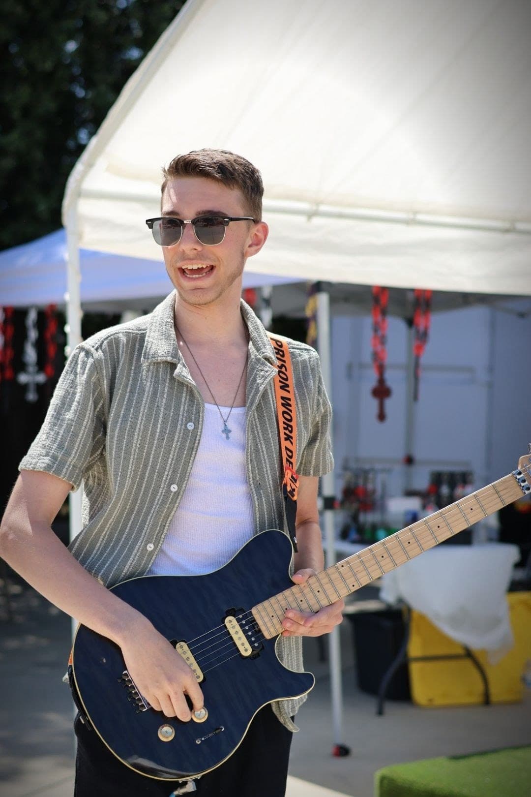 A young guitarist performing at the festival
