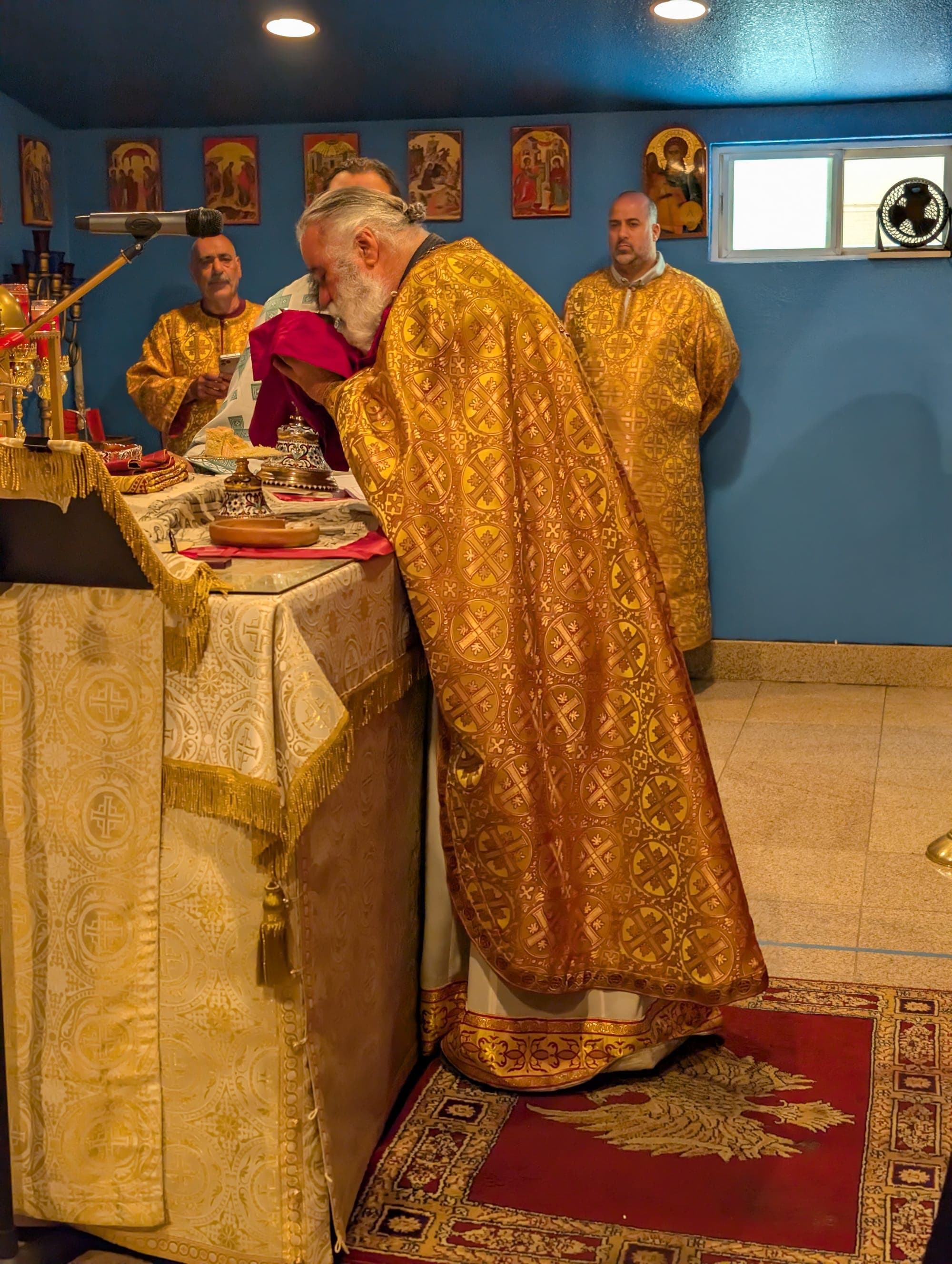 The priest at the altar